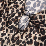 Top de manga larga acampanada con cuello en V y lazo anudado con estampado de leopardo 