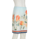 Minifalda fruncida con estampado floral en contraste 