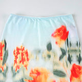 Minifalda fruncida con estampado floral en contraste 