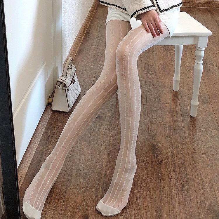 Collants en maille transparente à rayures verticales en dentelle 