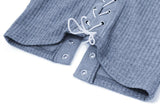 Long sleeve hollow out lace up textured round neck top