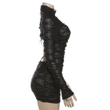 Vestido mini transparente de manga larga con cuello alto y aberturas 