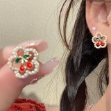 Pendientes con colgante de perla sintética con forma de corazón y lazo