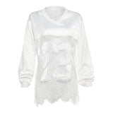 Top transparente con dobladillo de encaje y manga larga con cuello en V 