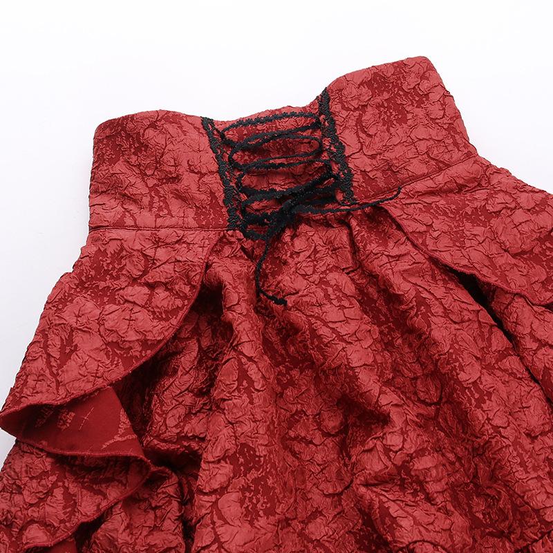 Mini-jupe zippée texturée à volants et corset à lacets 