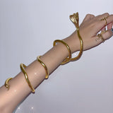Serpentine decor gold arm cuff