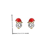 Boucles d'oreilles à tige en strass avec décoration de chapeau de Père Noël
