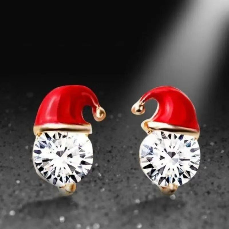 Boucles d'oreilles à tige en strass avec décoration de chapeau de Père Noël