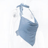 Top sin espalda, cuello vuelto, botones y lazo tipo halter 