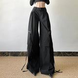 Pantalon droit taille haute avec poche zippée et bouton 