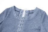 Long sleeve hollow out lace up textured round neck top