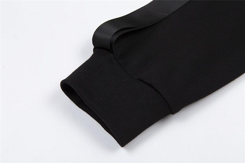 Haut asymétrique à manches longues et boutons avec boucle irrégulière 