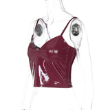 Top camisola de piel sintética con cuello en V y espalda descubierta 