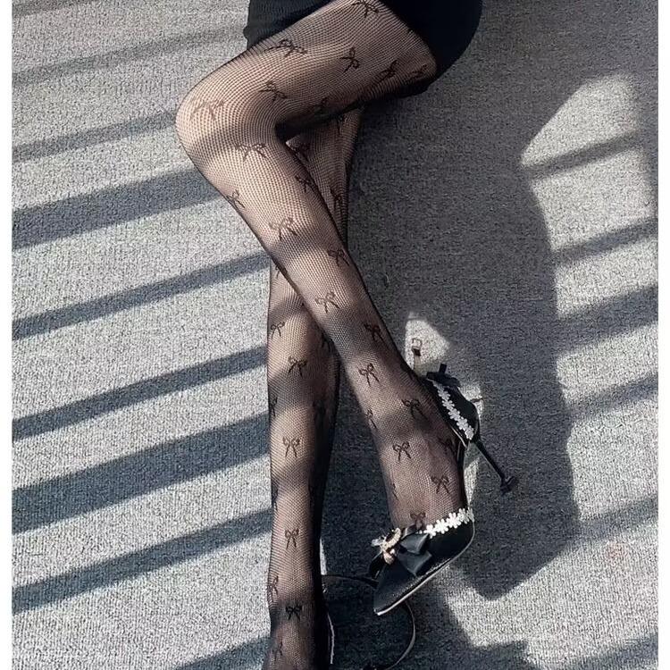 Medias de rejilla con estampado de lazo 