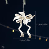 Décoration de sapin de Noël avec nœud blanc