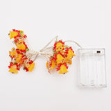 Cadena de luces decorativas con forma de campana y lazo