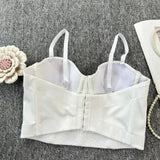 Haut camisole dos nu boutonné à col en V et perles 