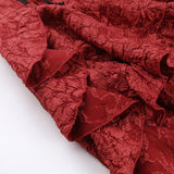 Mini-jupe zippée texturée à volants et corset à lacets 