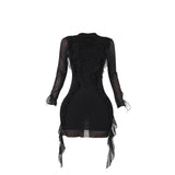 Mini-robe en maille à lacets et volants à manches longues 