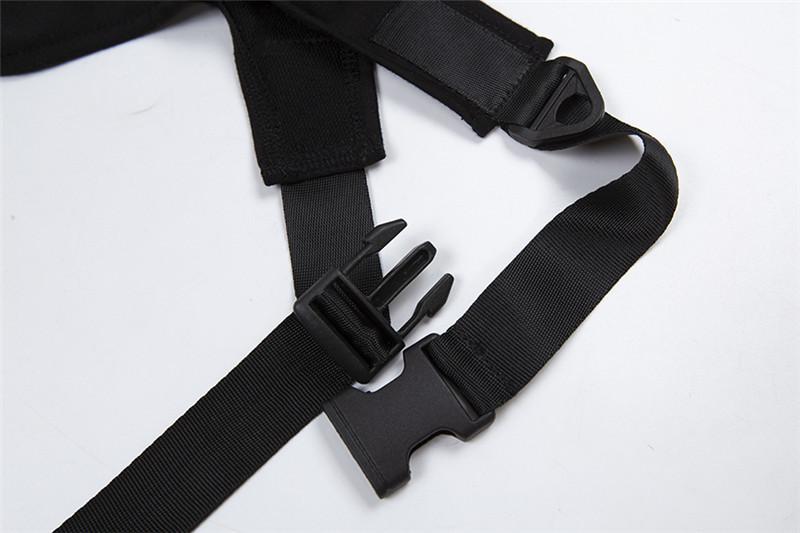 Haut asymétrique à manches longues et boutons avec boucle irrégulière 