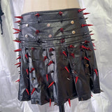 Conjunto de minifalda plisada con cremallera y apliques de remaches de cuero PU 