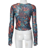 Top de cuello redondo de malla transparente con volantes y estampado de manga larga 