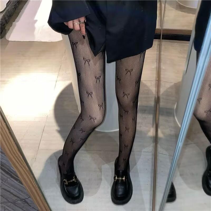 Medias de rejilla con estampado de lazo 