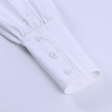 Long sleeve button turnover collar pocket solid top