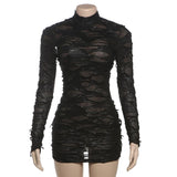 Vestido mini transparente de manga larga con cuello alto y aberturas 