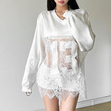 Top transparente con dobladillo de encaje y manga larga con cuello en V 