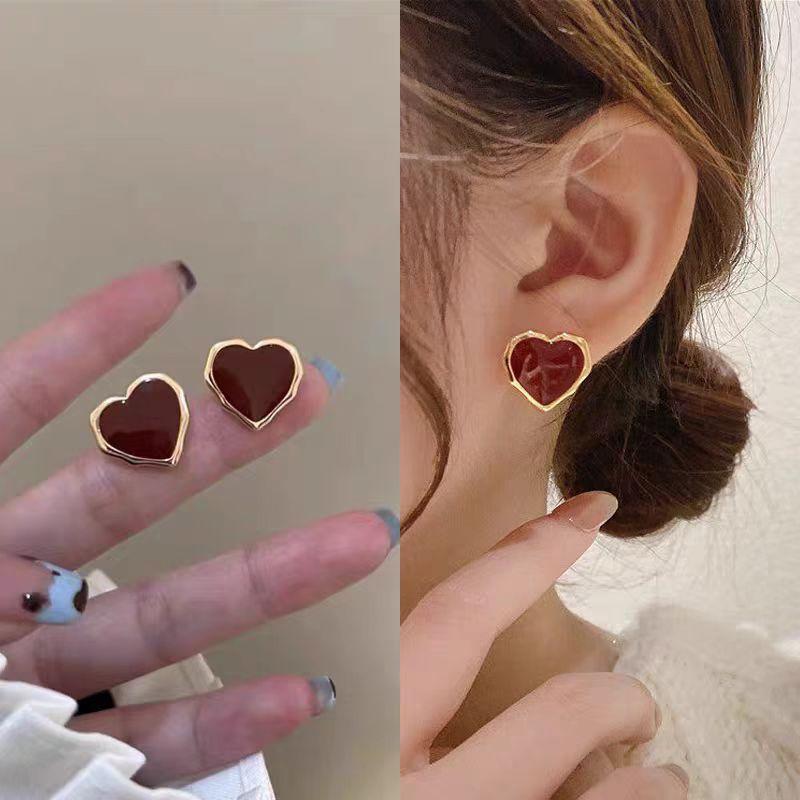 Pendientes con colgante de perla sintética con forma de corazón y lazo