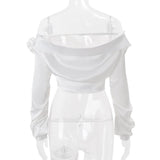 Blusa de manga larga con botones y apliques de flores en los hombros 