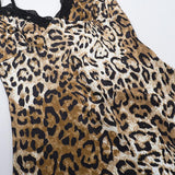 Robe midi à imprimé léopard avec ourlet en dentelle et col en V 