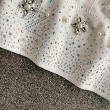 Haut camisole dos nu rembourré à col en V et perles 