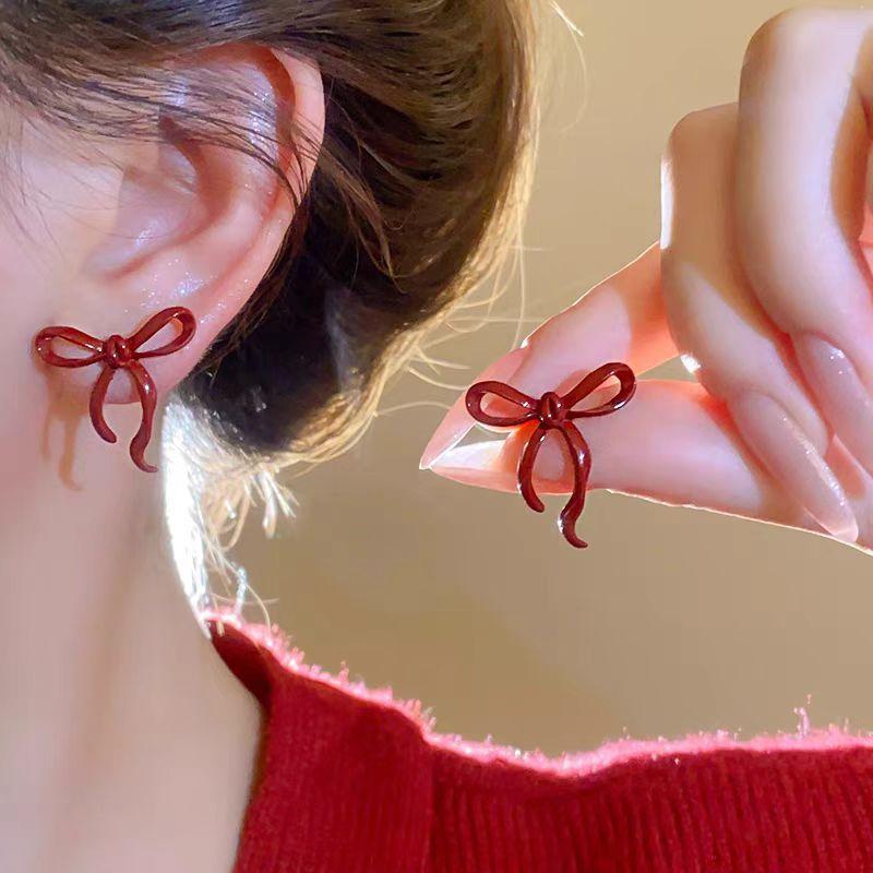 Pendientes con colgante de perla sintética con forma de corazón y lazo