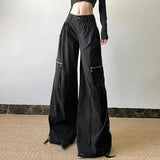 Pantalon droit taille haute avec poche zippée et bouton 
