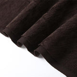Irregular ruffle PU leather buckle mini skirt