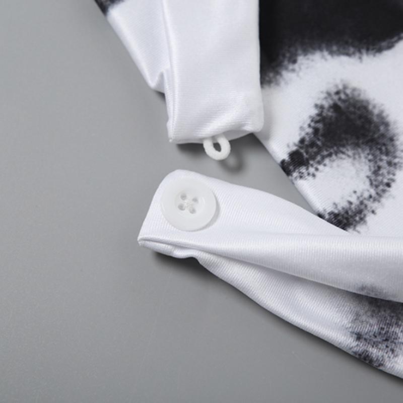 Haut dos nu imprimé avec ourlet en dentelle et boutons licou 