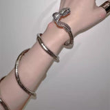 Serpentine decor gold arm cuff
