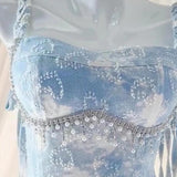 Mini-robe caraco contrastée en denim à col en V et perles 