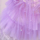 Mini-robe froncée avec ourlet en dentelle, volants et nœud papillon 