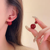 Pendientes con colgante de perla sintética con forma de corazón y lazo