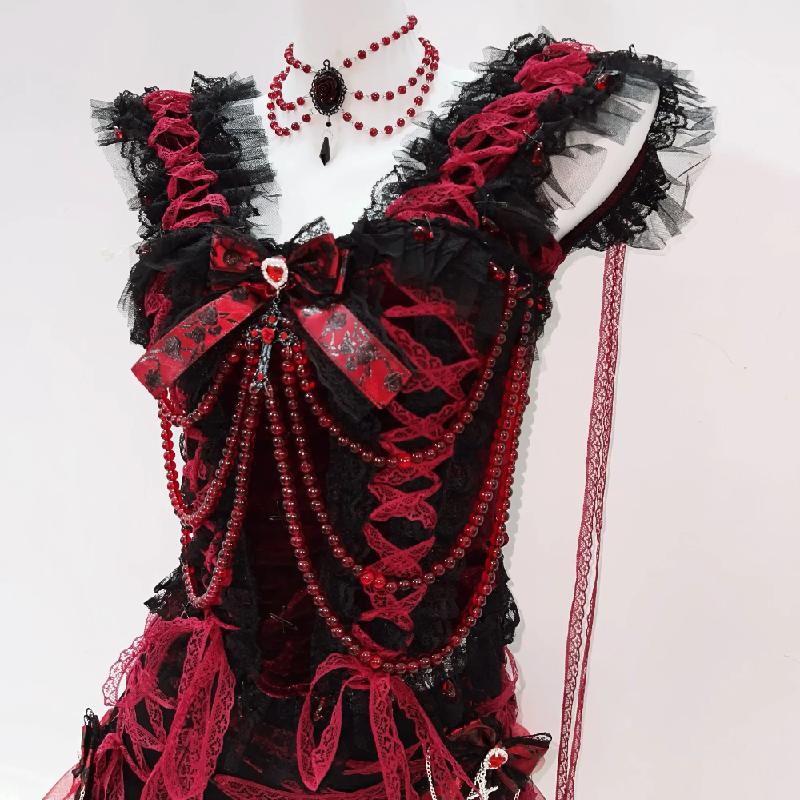 Ensemble mini-jupe à col en V et ourlet en dentelle perlée avec nœud papillon 
