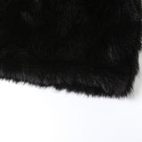 Mini-robe tube en cuir PU duveteux avec fermeture éclair et dos nu 
