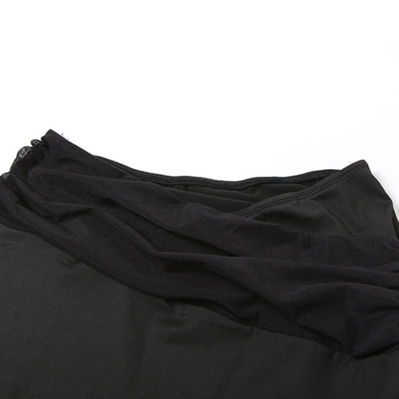 Conjunto de minifalda sin espalda de malla hueca irregular 