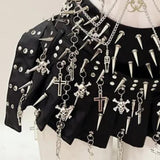 Ensemble mini-jupe plissée en cuir PU avec appliques de rivets en forme de tête de mort 
