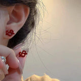 Pendientes con colgante de perla sintética con forma de corazón y lazo