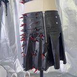 Conjunto de minifalda plisada con cremallera y apliques de remaches de cuero PU 