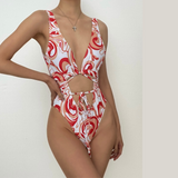 Maillot de bain une pièce à imprimé contrasté et décolleté plongeant, ajouré et à nouer soi-même 