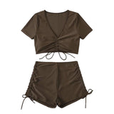 Traje de baño bikini con top corto y lazo ajustable de manga corta en color liso 